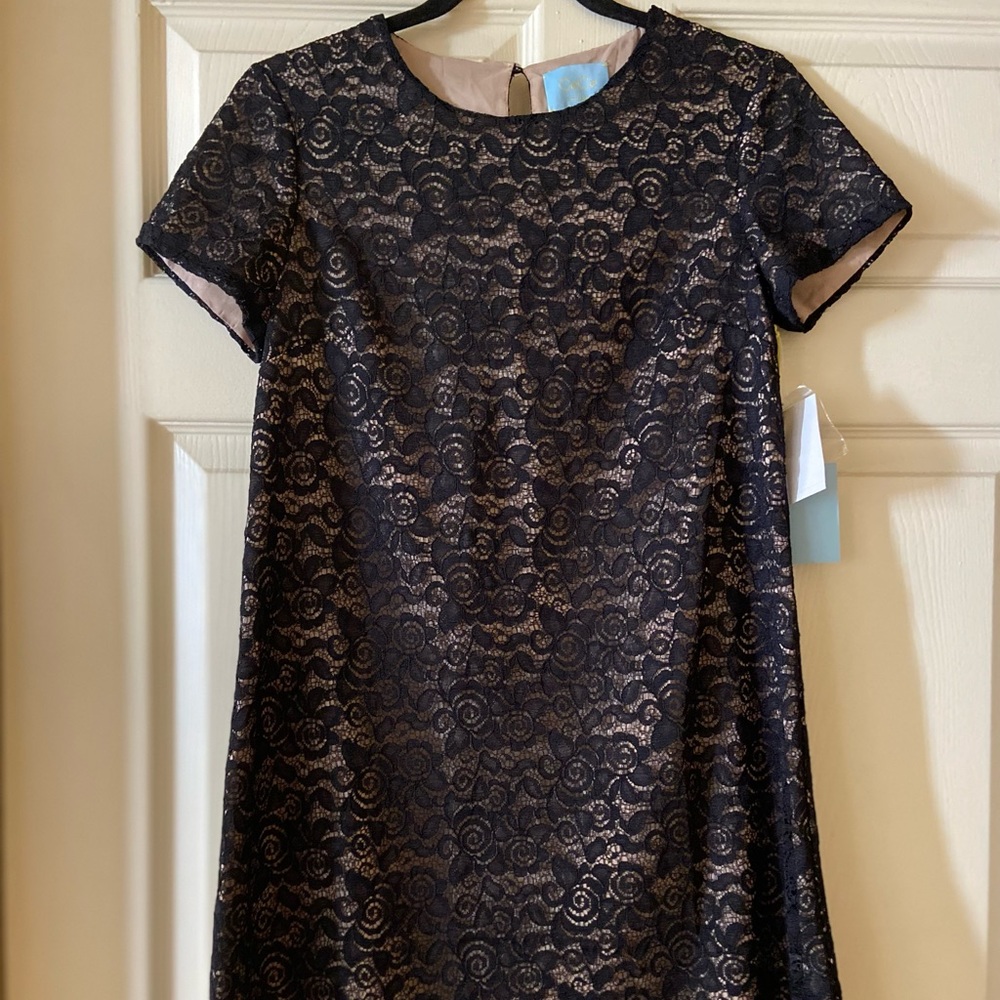 Brand NEW little black dress with cream undertone and flower embroidered lace.